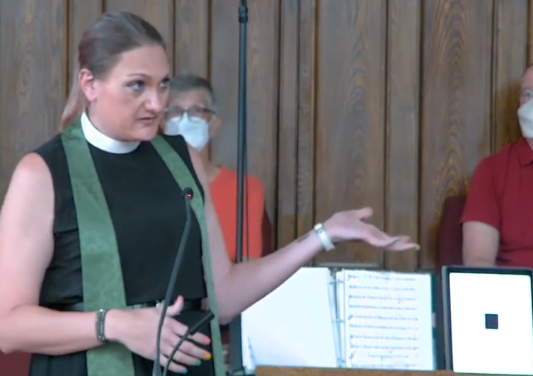 Rev. June Joplin speaking from the pulpit.