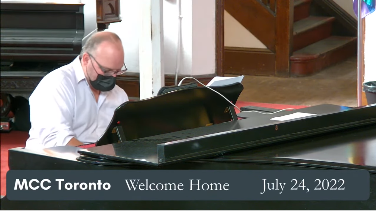 Picture of Jason Jestadt playing the piano at the Sanctuary