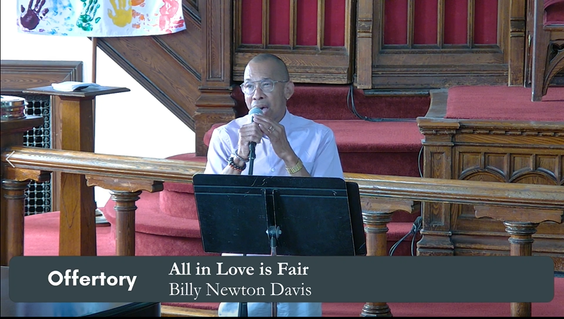 Picture of Billy Newton-Davis singing at MCC Toronto's Sanctuary