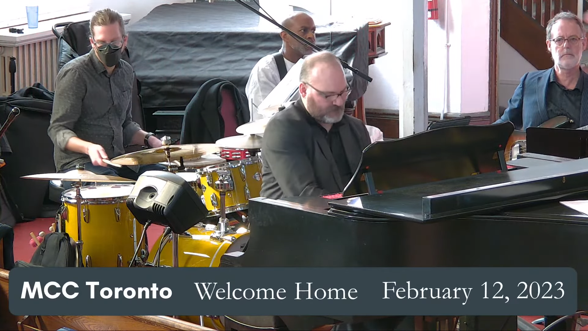 Picture of Music ministry team playing music in MCC Toronto Sanctuary.