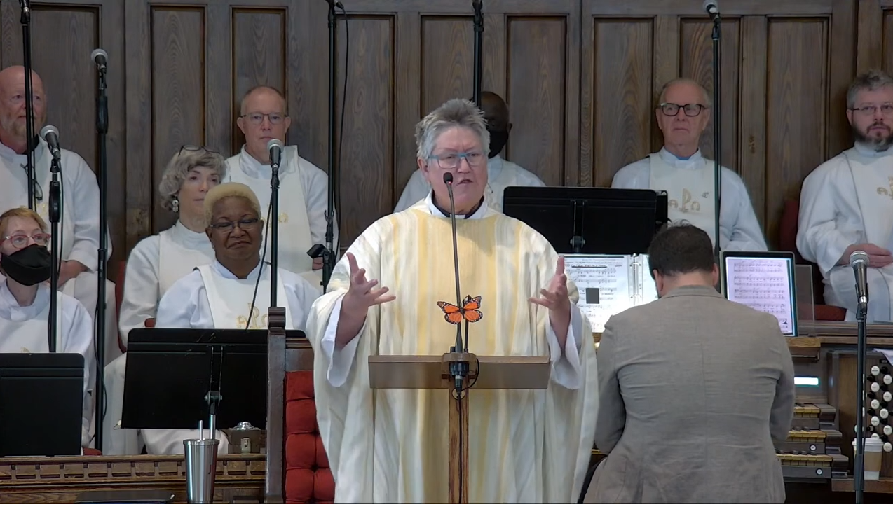 Rev. Deana Dudley peaching at the pulpit