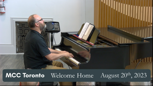 Picture of Jason Jestadt, MCC Toronto's Music Director playing the piano
